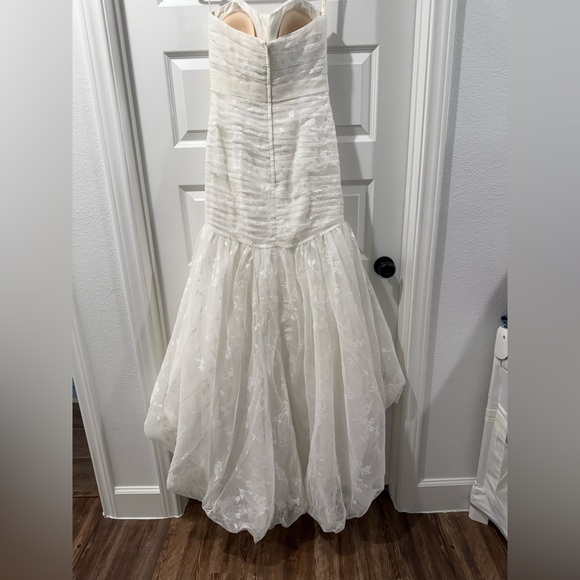 Elegant Strapless Ivory Wedding Dress - Picture 4 of 15